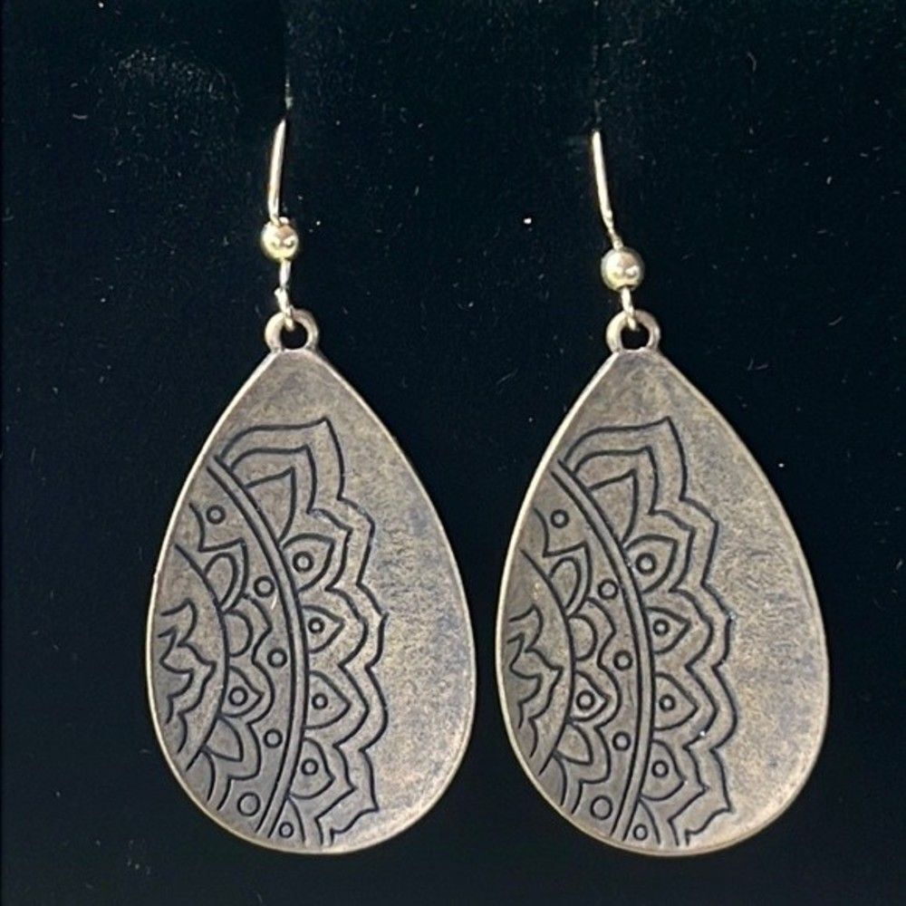 Handcrafted antiqued gold earrings.